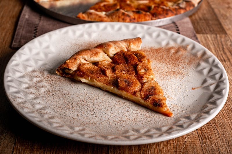 Cinnamon dessert pizza with caramel drizzle